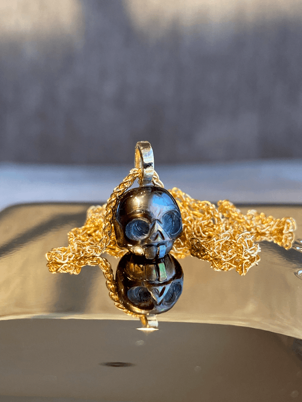 Scull perle sort